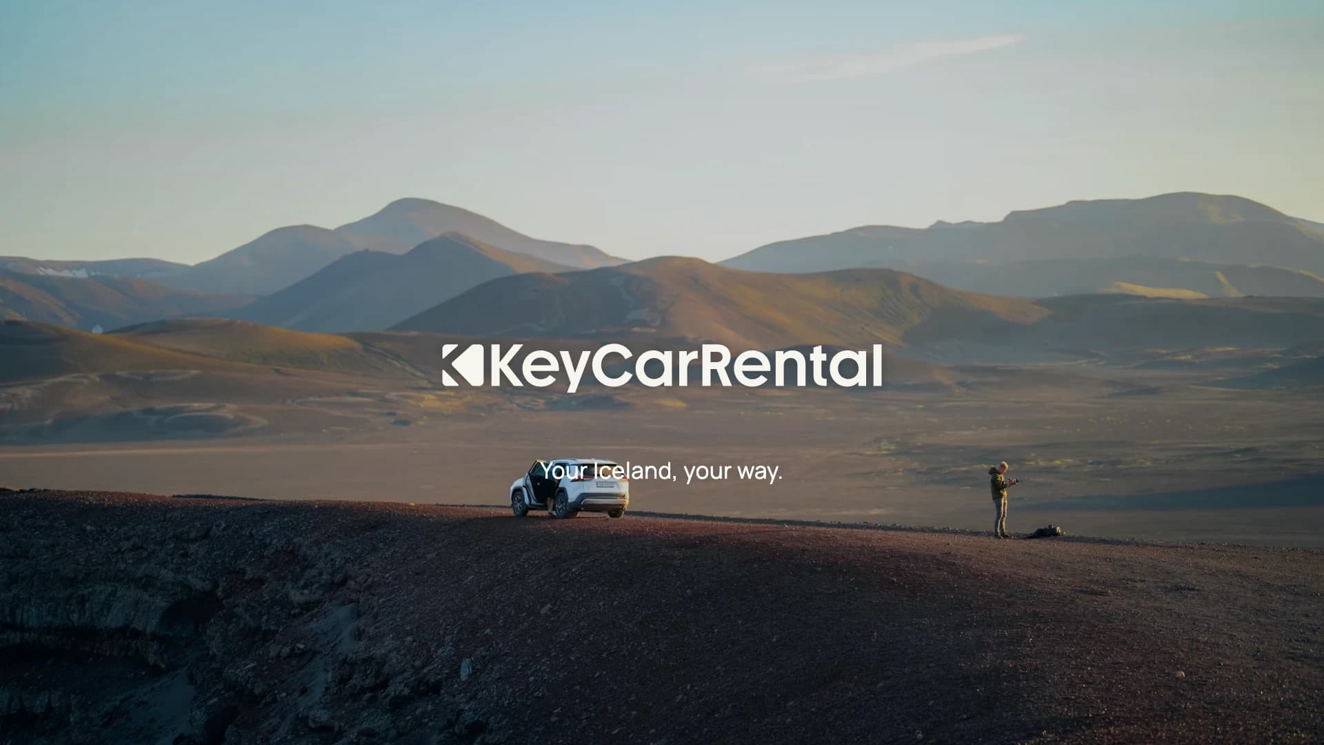An eight-second Key Car Rental road-trip film: Icelandic roads, travellers and a car crossing a lava field